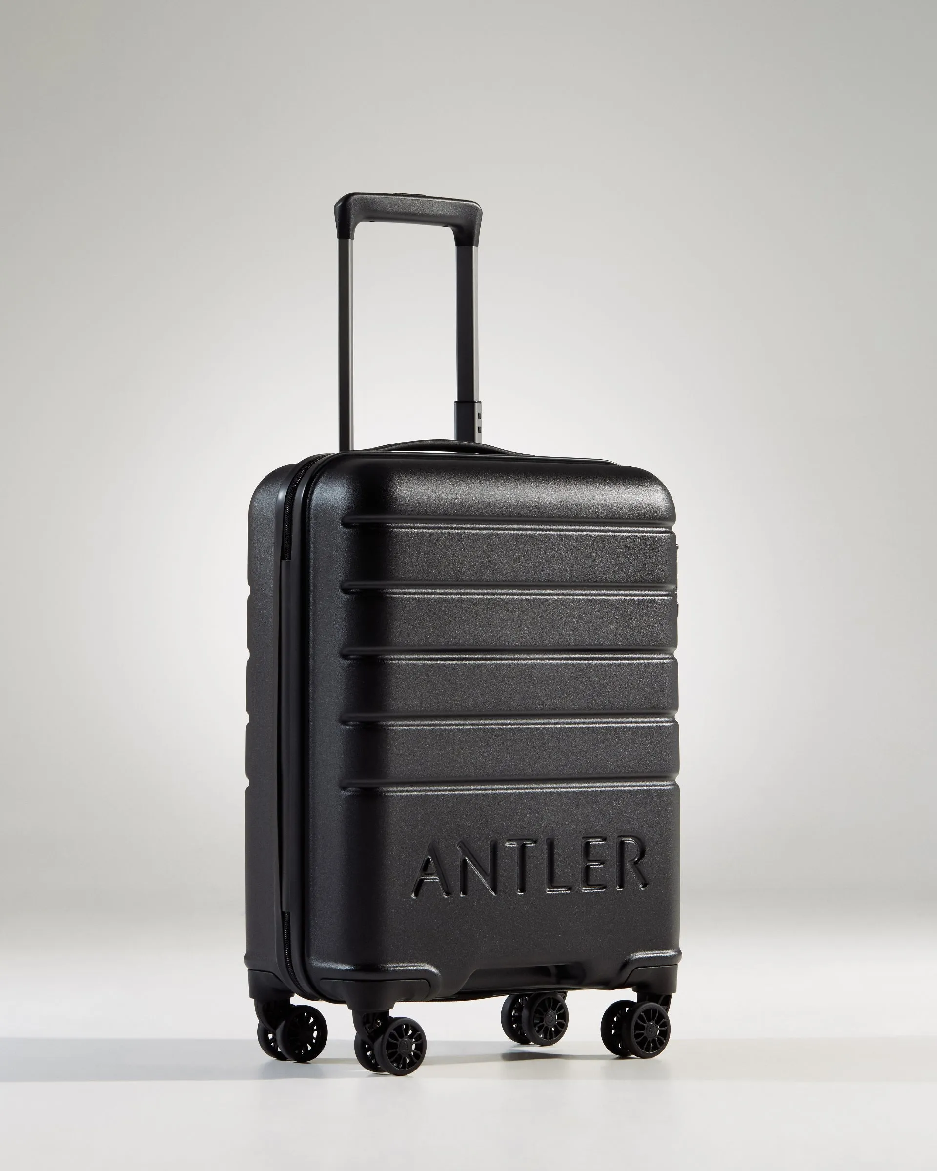 Cabin Suitcase in Black - Logo